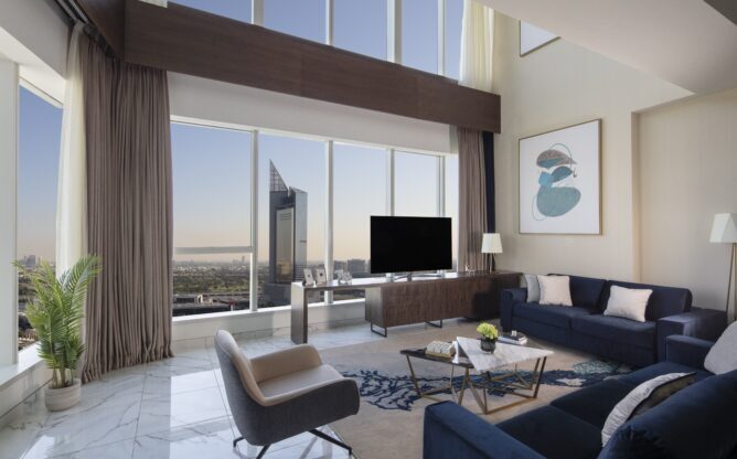 Avani_Plus_Palm_View_Dubai_Hotel_and_Suites_Guest_Room_Superior_Duplex_Apartment_City_View_Living_Room
