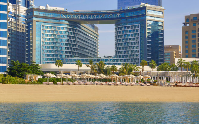 NH_Collection_Dubai_The_Palm_Facade_Exterior_with_Beach_Club_Setup